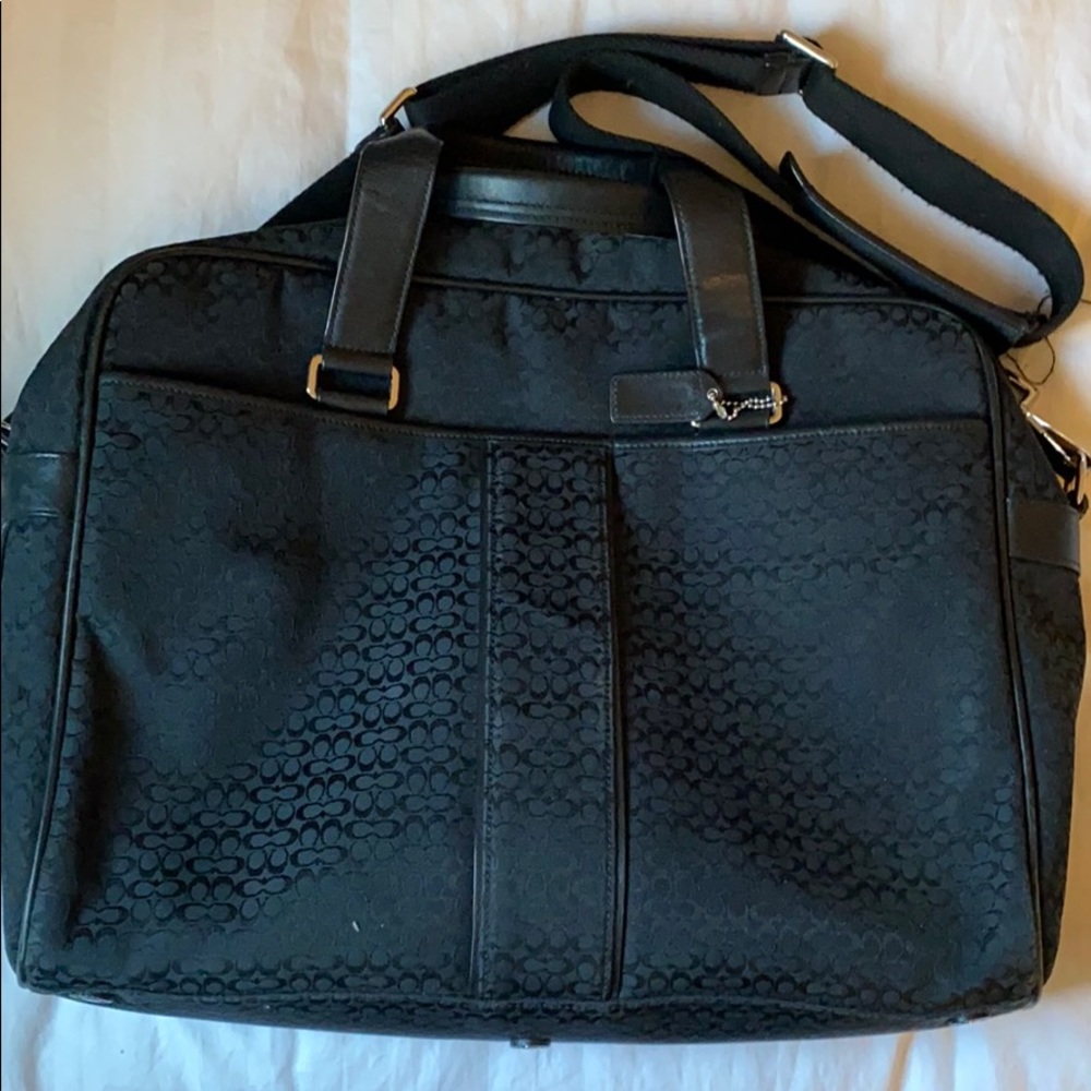 COACH shoulder bag with strap.